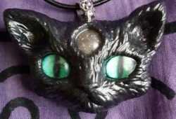 El Gato de las Brujas / Poderoso amuleto